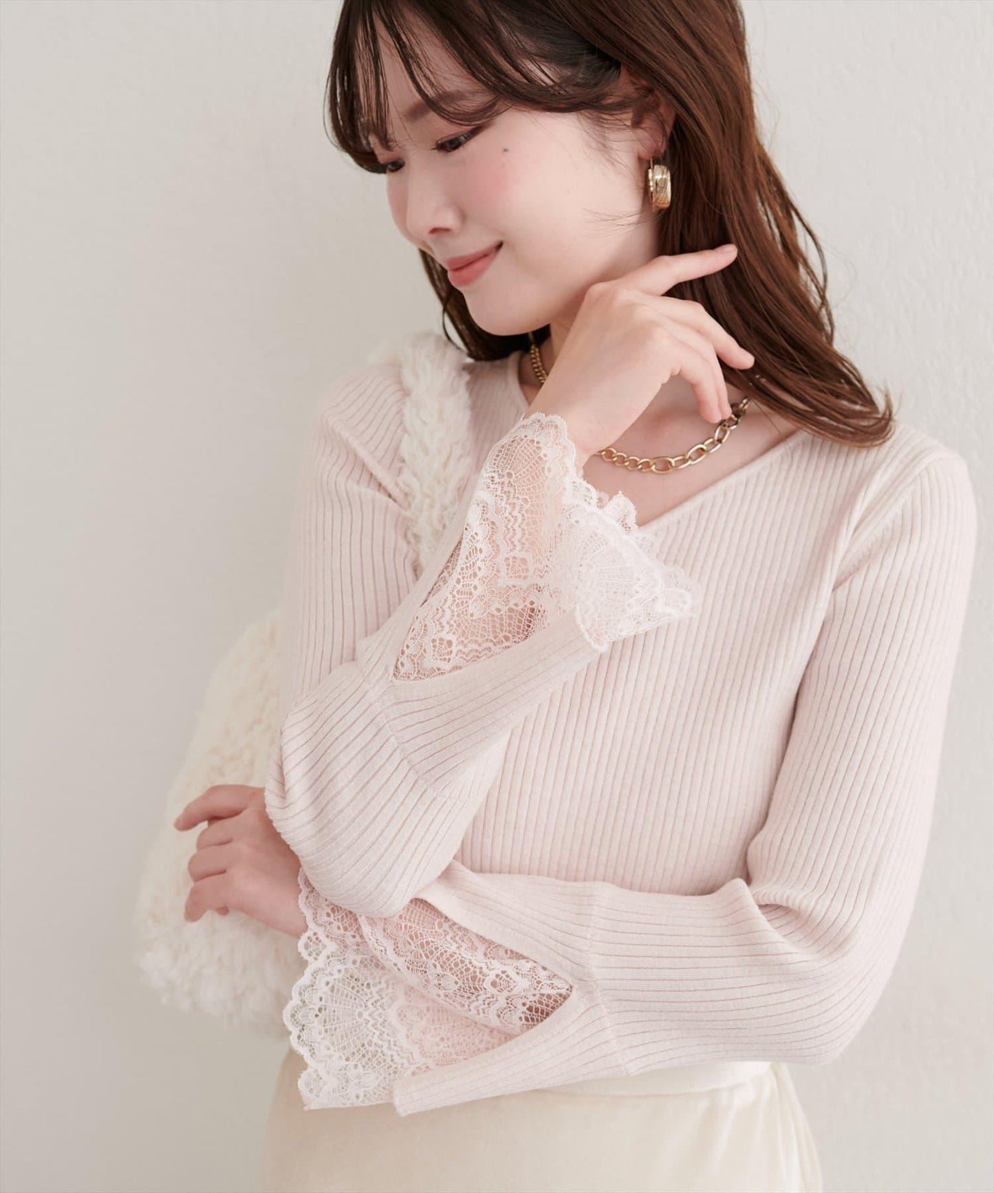 前後兩穿袖口蕾絲羅紋針織衫