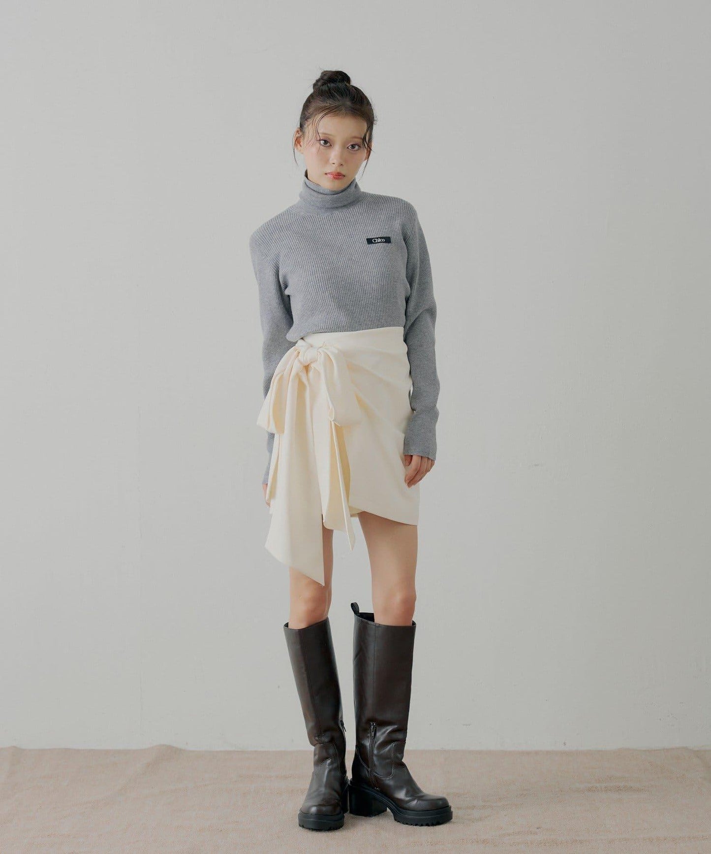 蝴蝶結包裹半身裙+休閒短褲