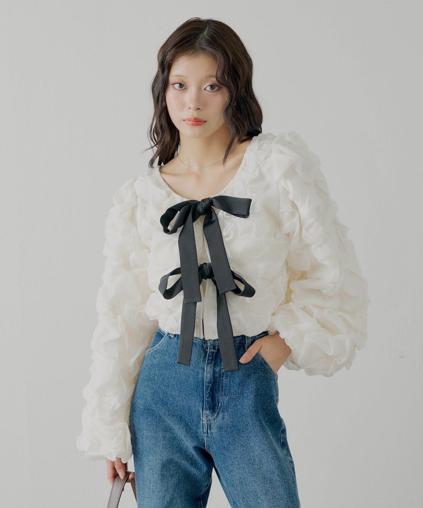 前後兩穿立體蝴蝶結泡泡紋理襯衫