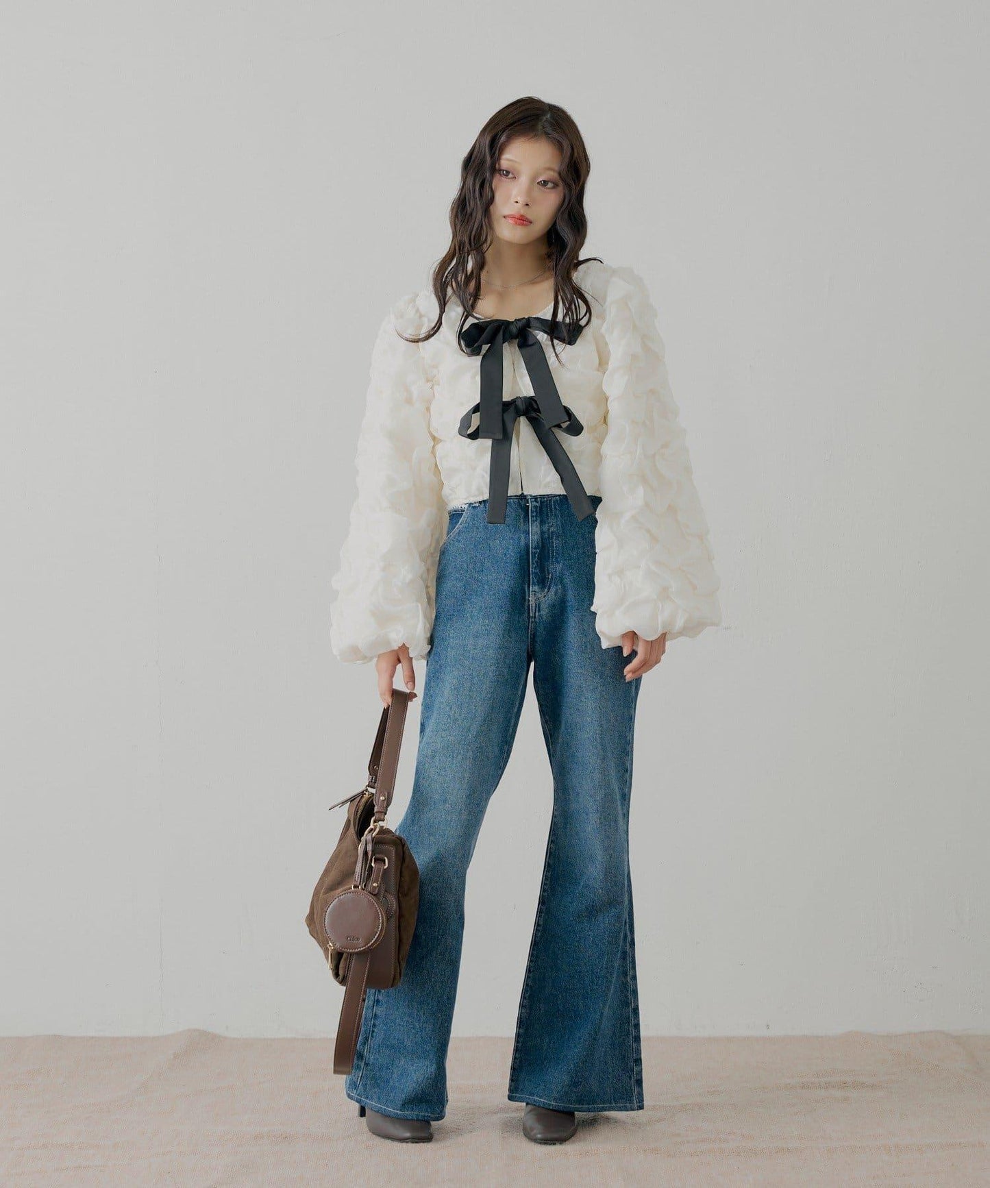 前後兩穿立體蝴蝶結泡泡紋理襯衫