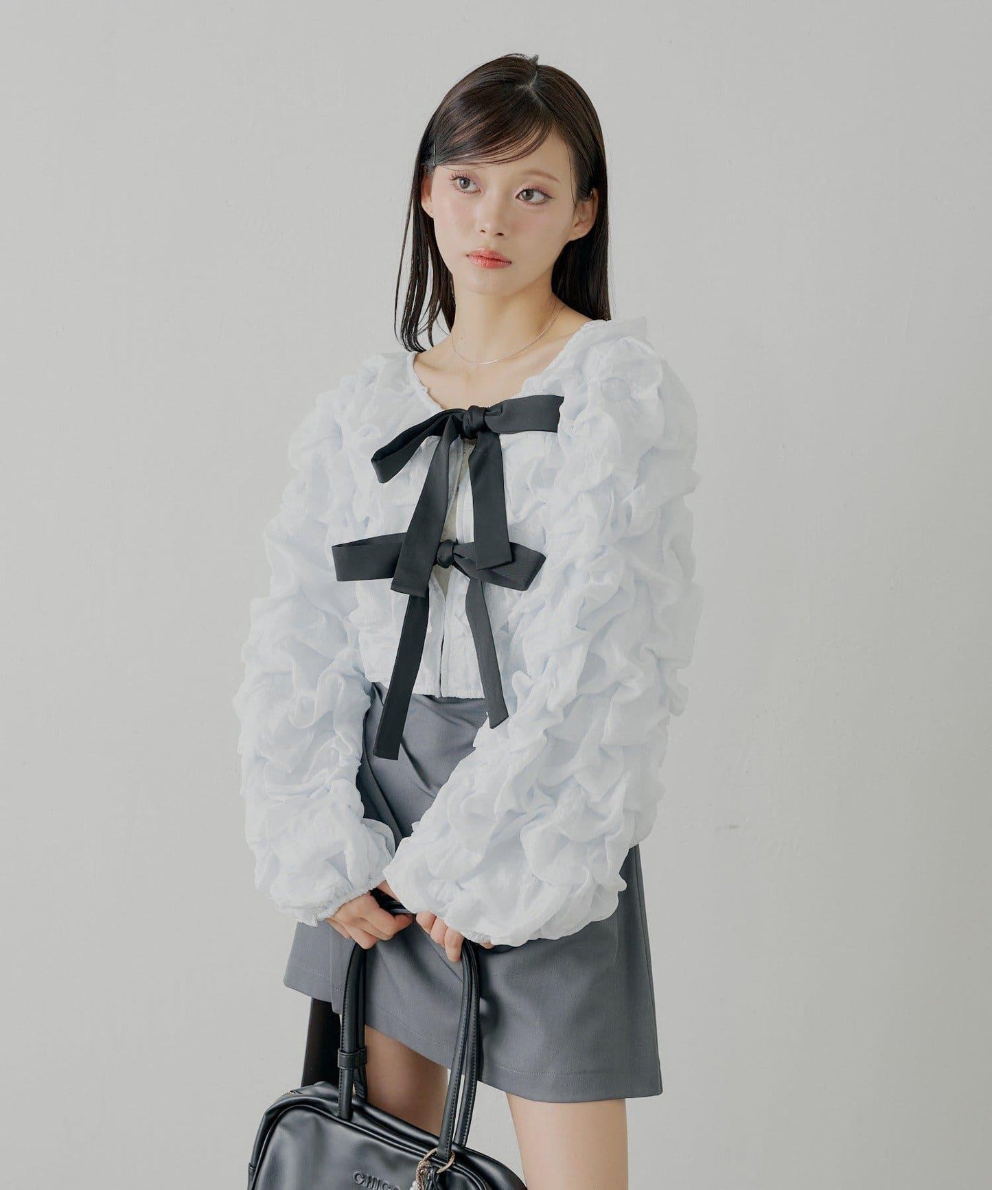 前後兩穿立體蝴蝶結泡泡紋理襯衫