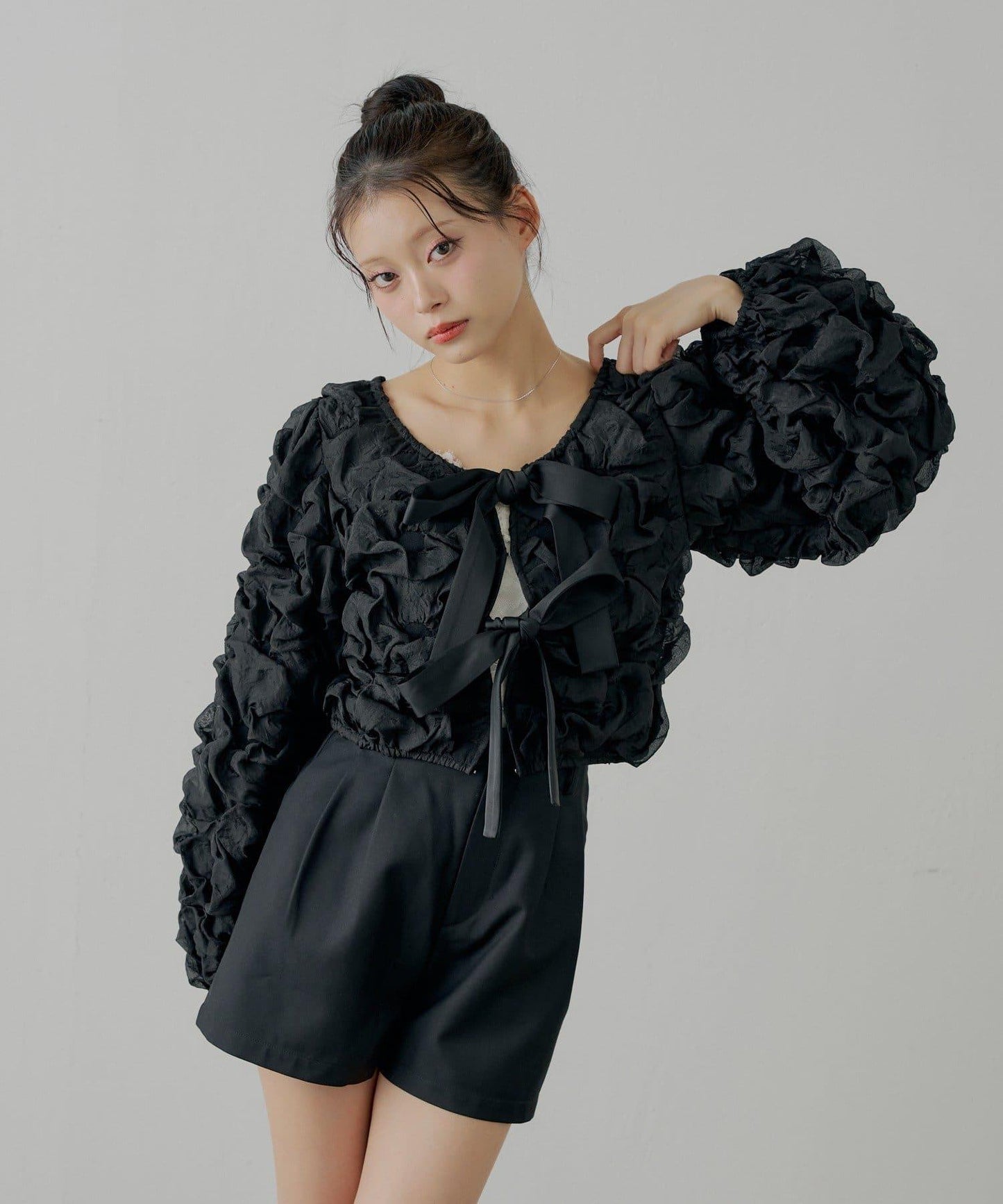 前後兩穿立體蝴蝶結泡泡紋理襯衫