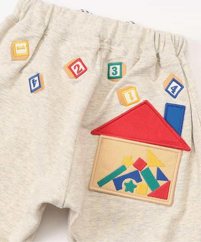 積木玩樂刺繡哈倫束腳褲 九分褲