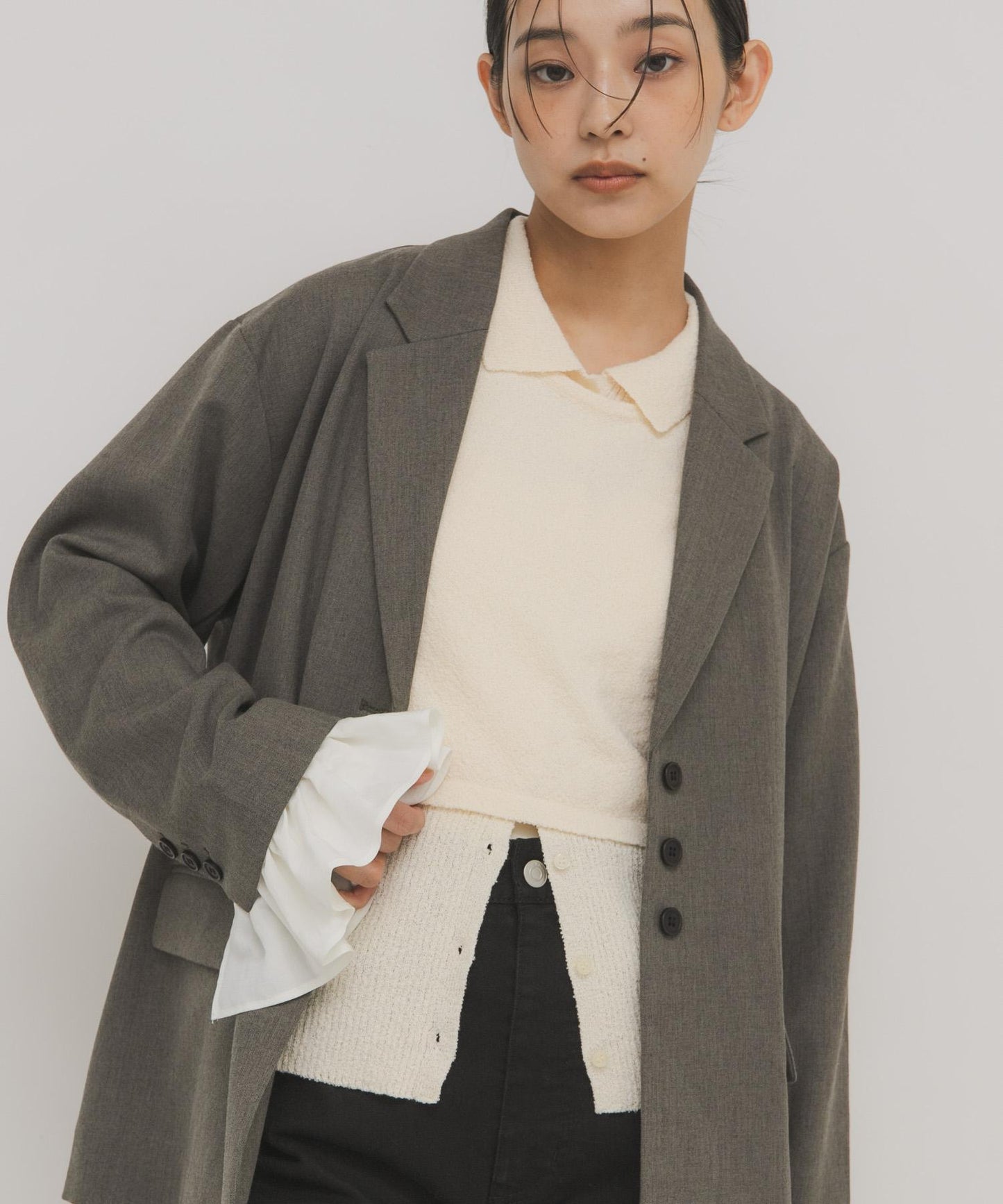 一部分色迷你圈圈紗疊穿針織襯衫