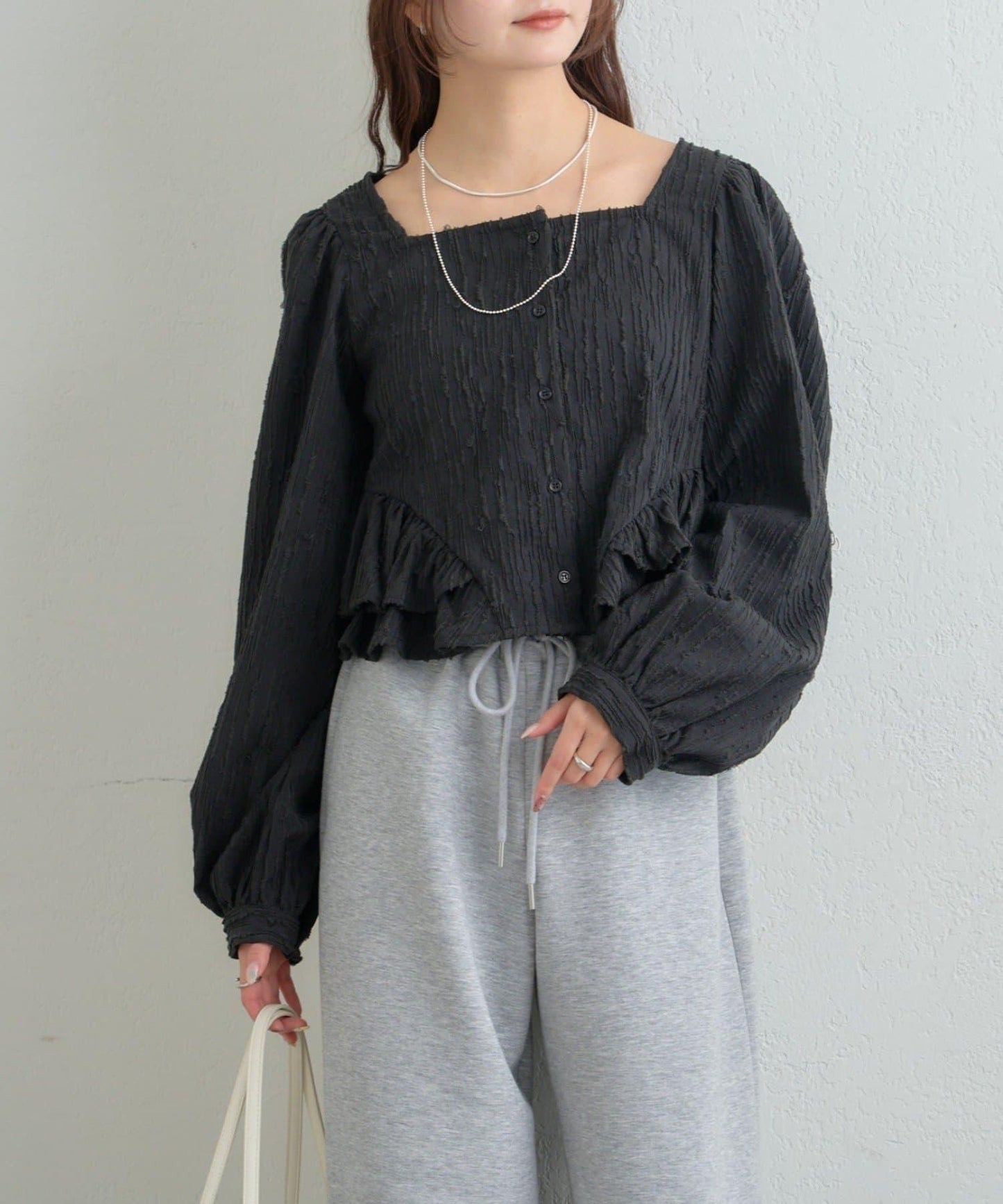 提花下襬荷葉邊襯衫