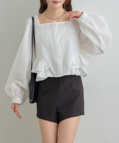 提花下襬荷葉邊襯衫