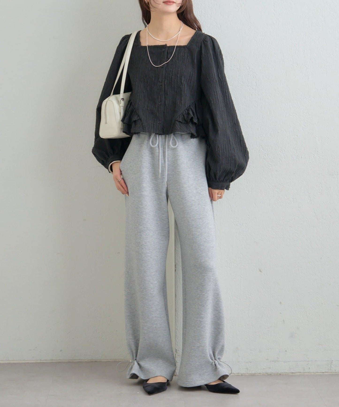 提花下襬荷葉邊襯衫