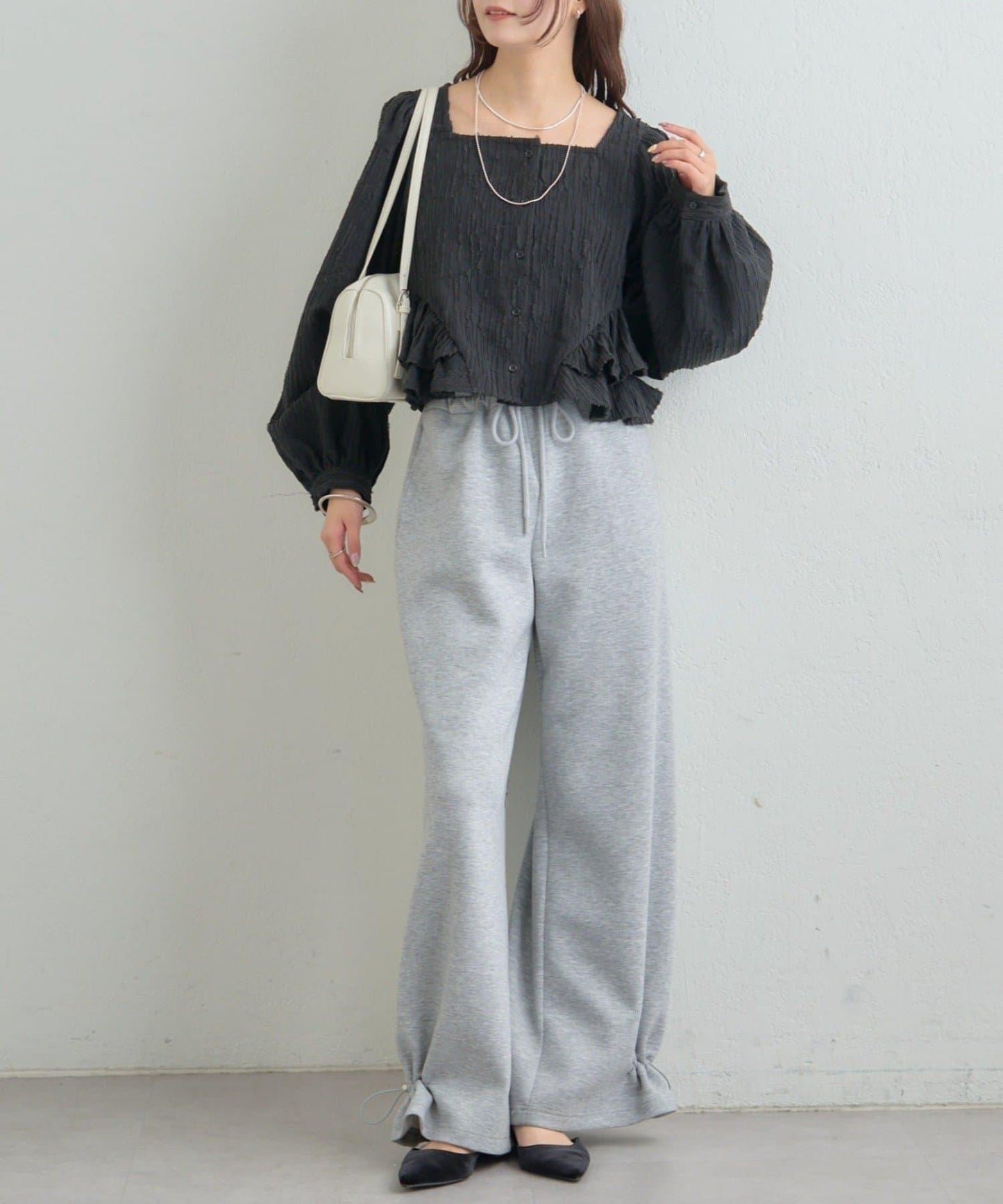 提花下襬荷葉邊襯衫