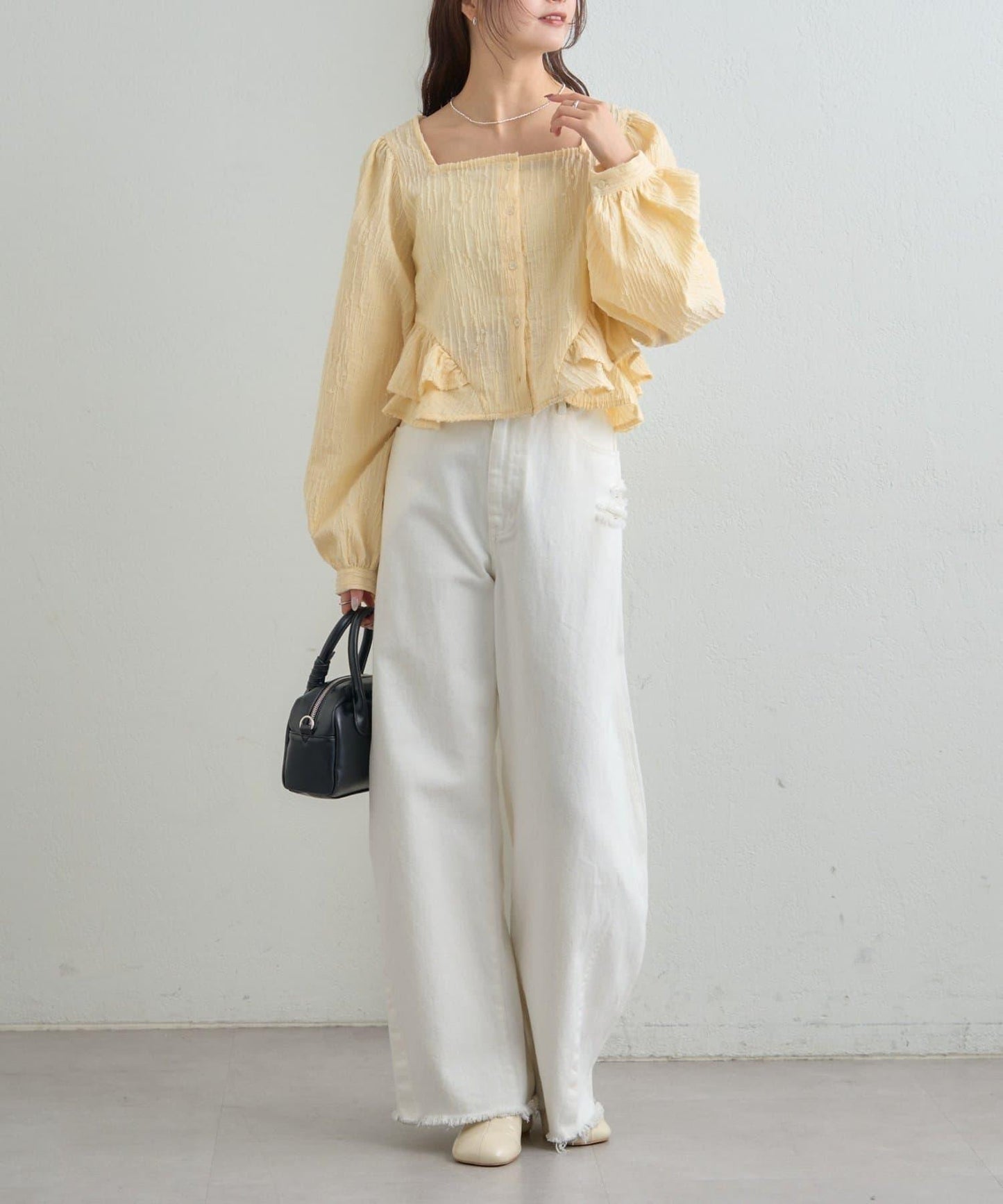 提花下襬荷葉邊襯衫