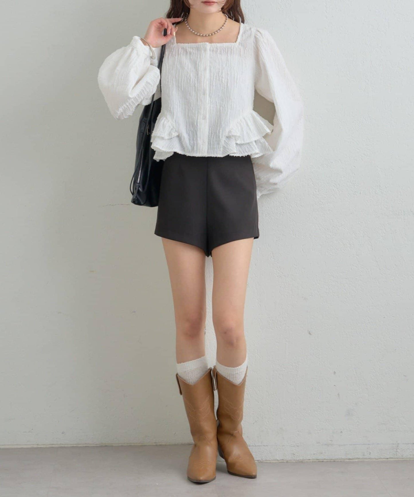 提花下襬荷葉邊襯衫