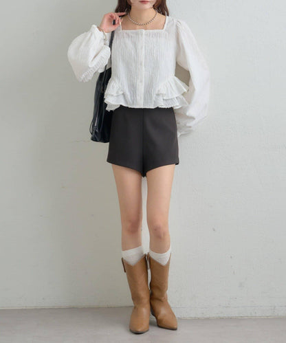 提花下襬荷葉邊襯衫