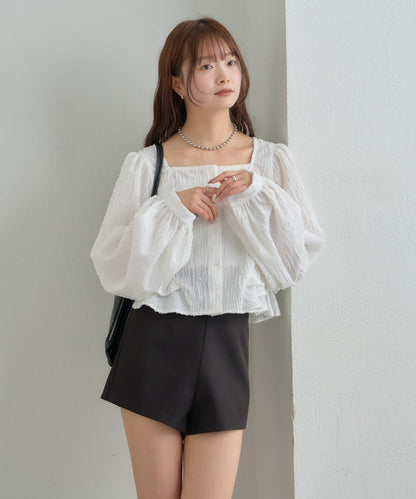 提花下襬荷葉邊襯衫