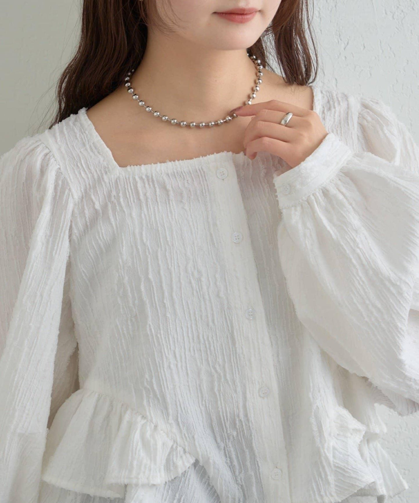 提花下襬荷葉邊襯衫