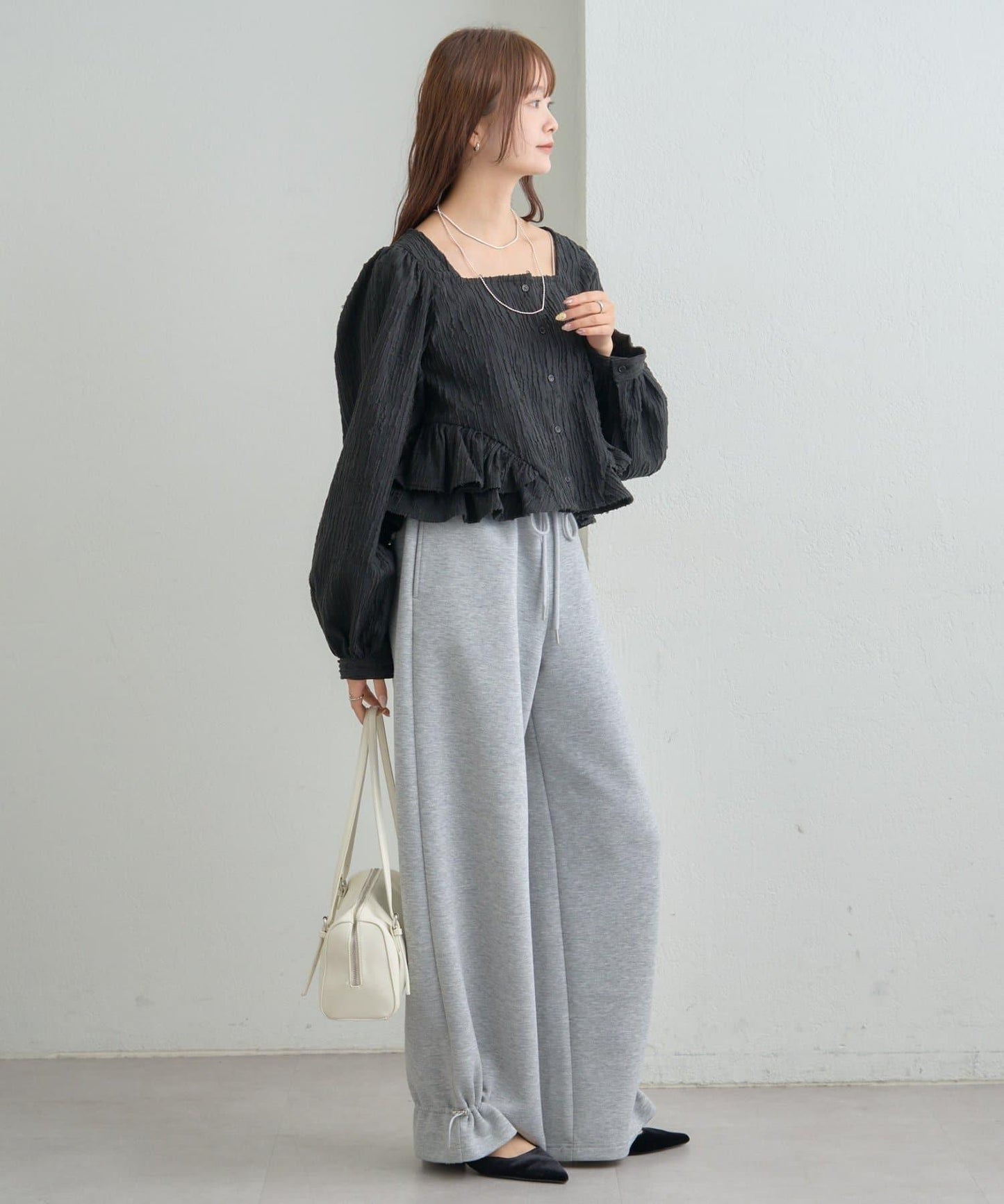 提花下襬荷葉邊襯衫