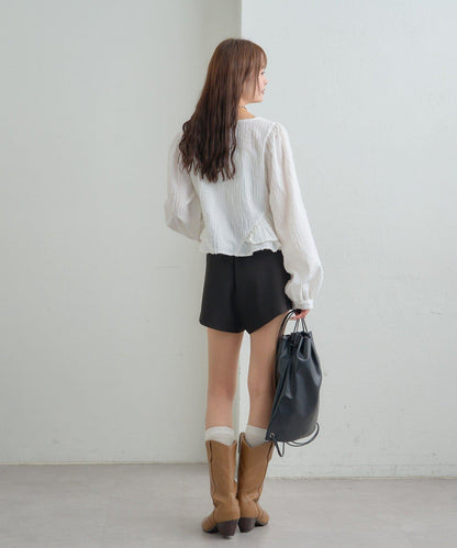 提花下襬荷葉邊襯衫