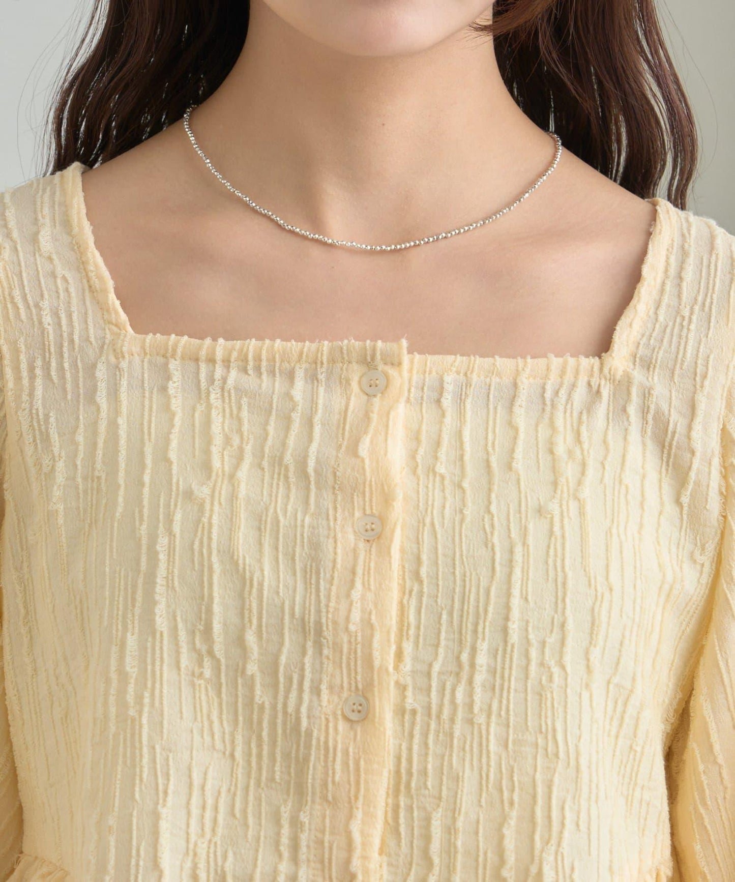 提花下襬荷葉邊襯衫