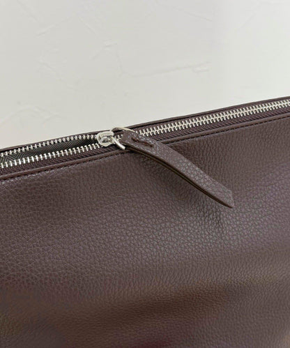 金屬孔眼裝飾肩揹包