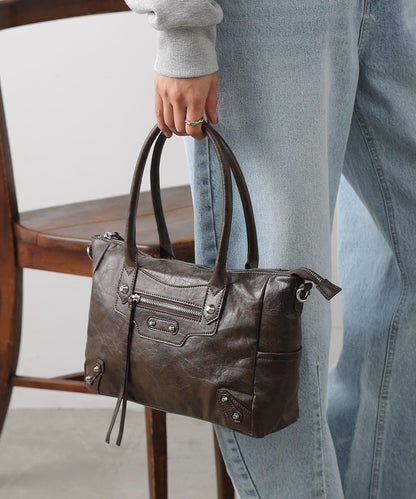 鉚釘裝飾手提包