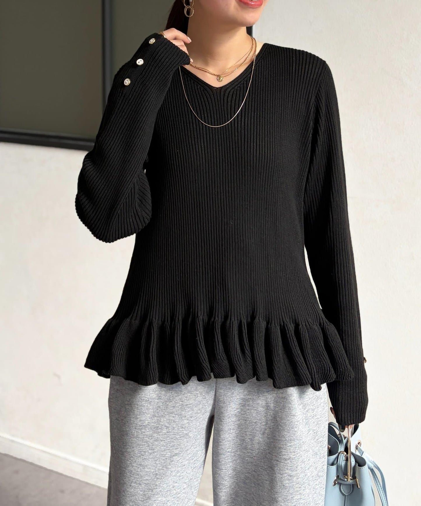 下襬荷葉邊針織套頭上衣