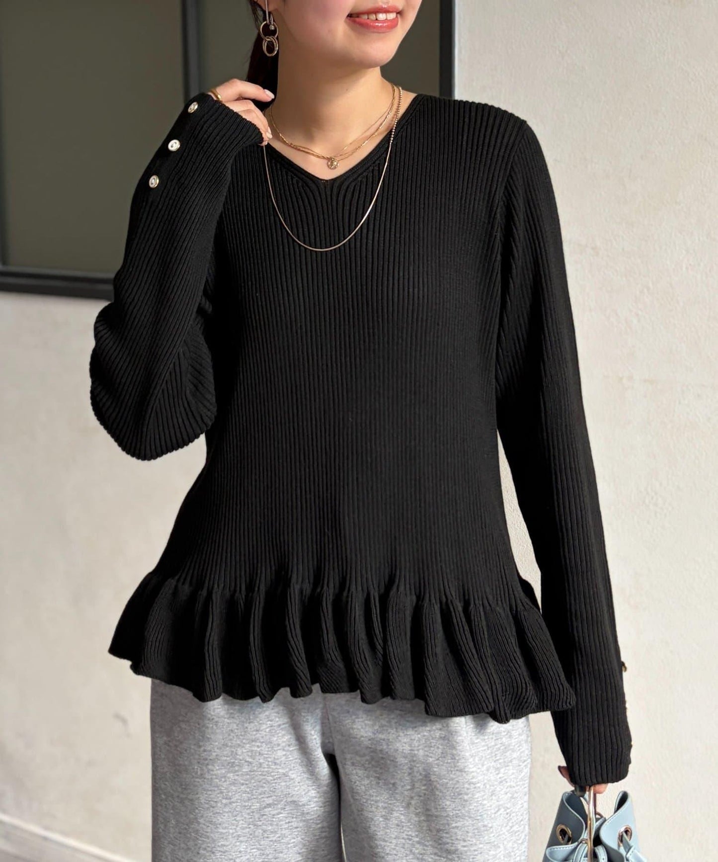 下襬荷葉邊針織套頭上衣