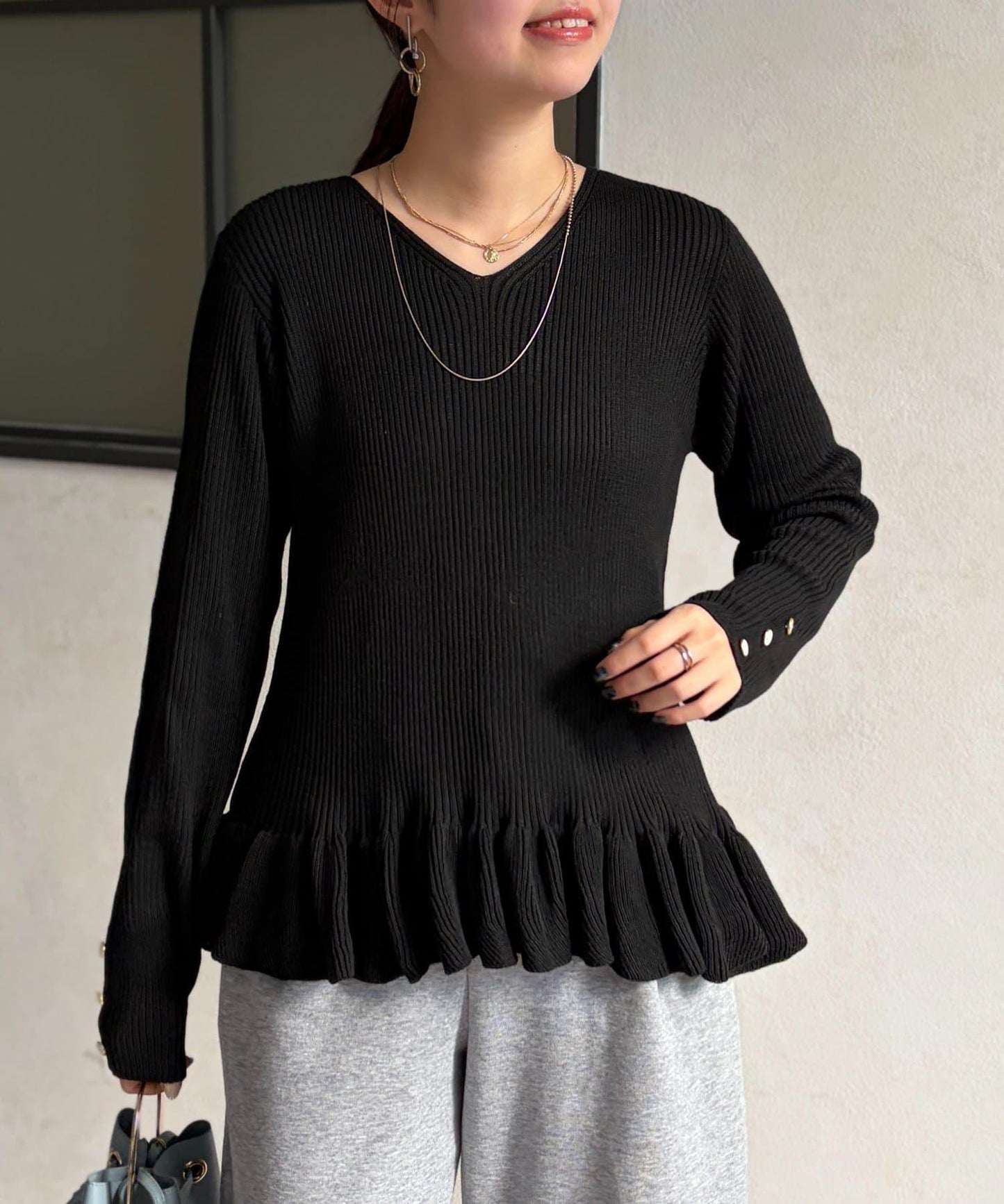 下襬荷葉邊針織套頭上衣