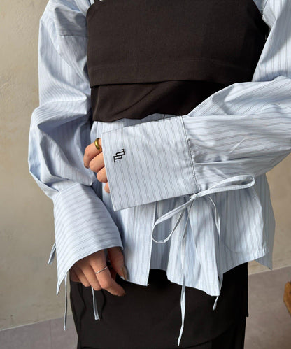 背心拼接袖部蝴蝶結襯衫