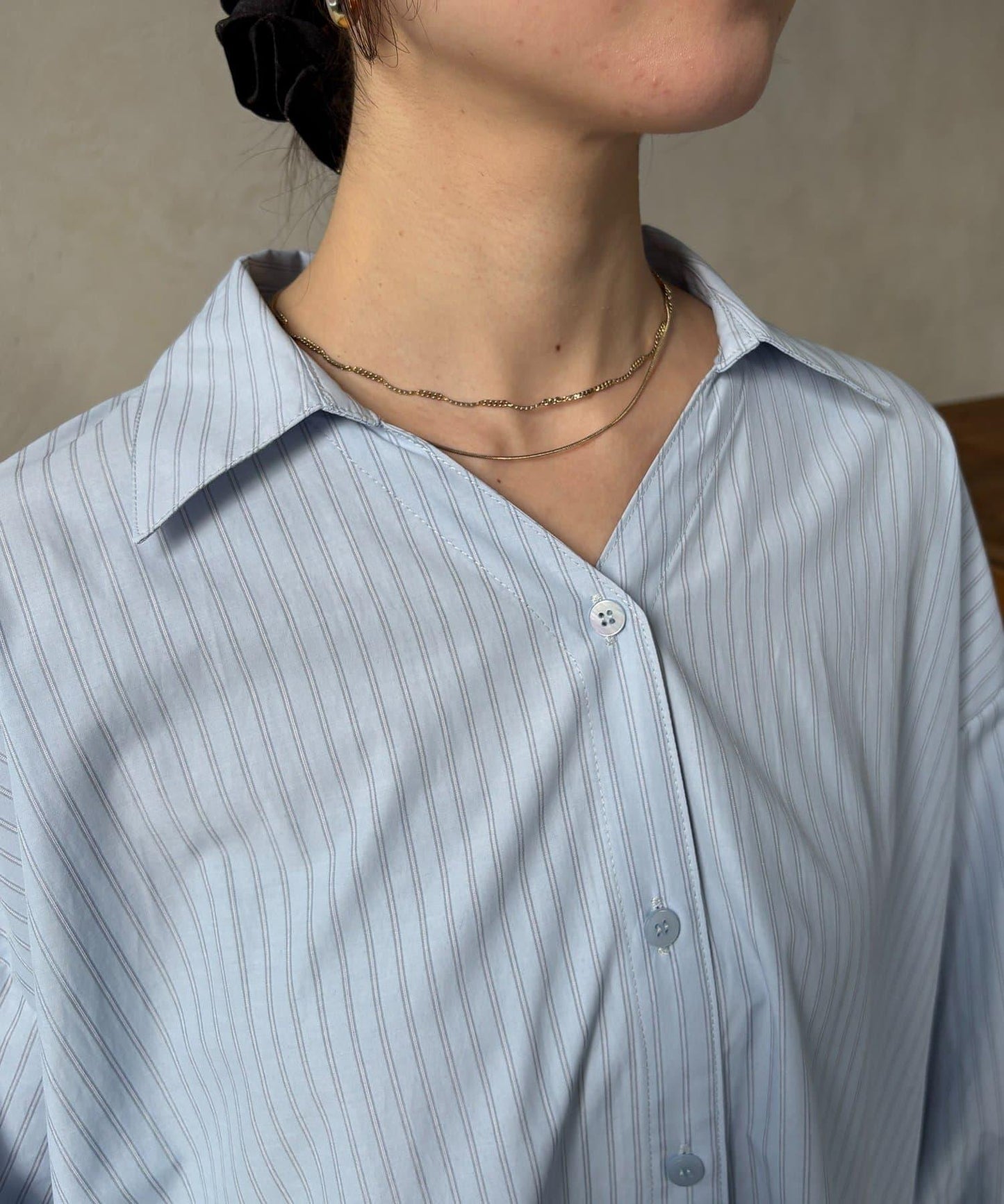 背心拼接袖部蝴蝶結襯衫