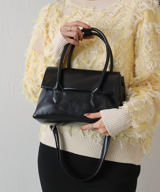 小巧翻蓋手提包