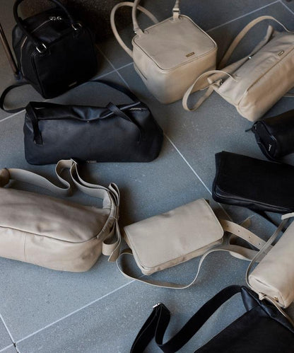 牛革防潑水翻蓋設計單肩包