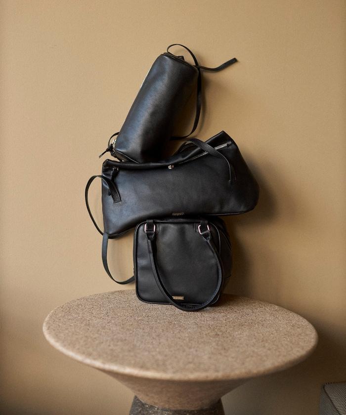 牛革防潑水翻蓋設計單肩包