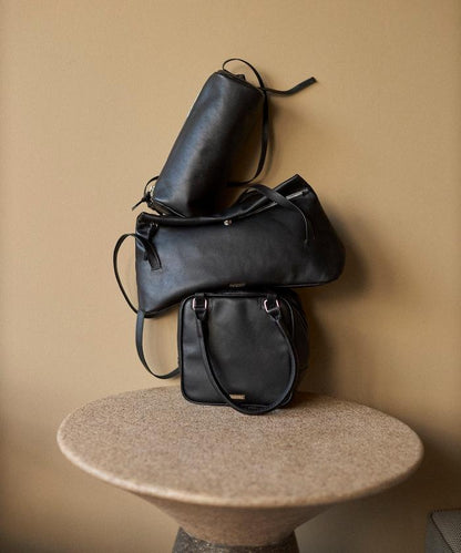 牛革防潑水翻蓋設計單肩包