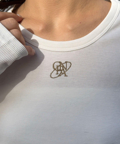 裾レースストレッチリブトップス