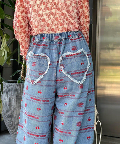 下襬荷葉邊滿版刺繡寬鬆闊腿牛仔褲