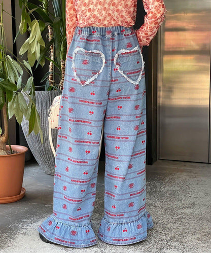 下襬荷葉邊滿版刺繡寬鬆闊腿牛仔褲