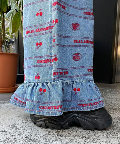 下襬荷葉邊滿版刺繡寬鬆闊腿牛仔褲