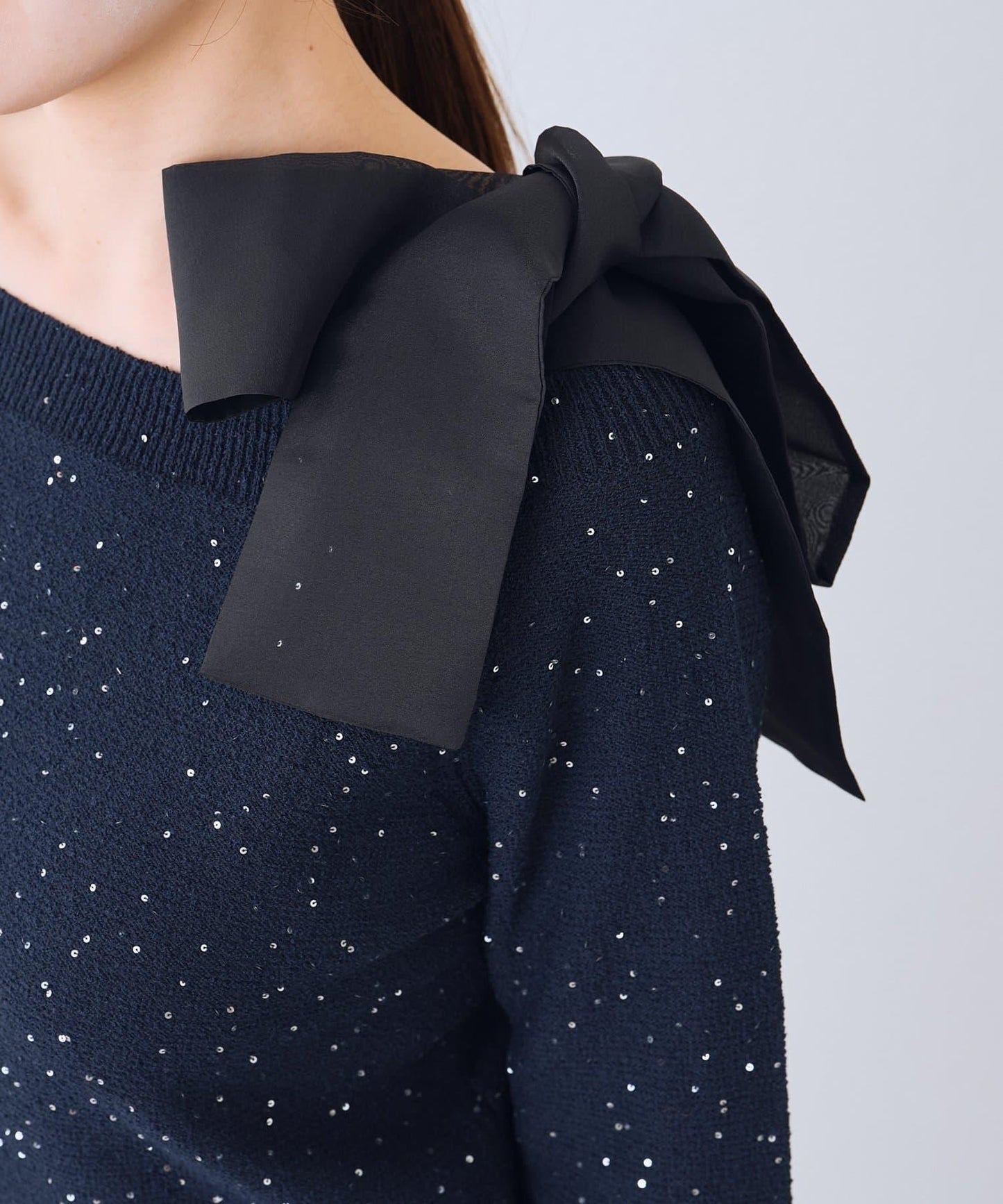 亮片圈圈紗露肩蝴蝶結針織上衣