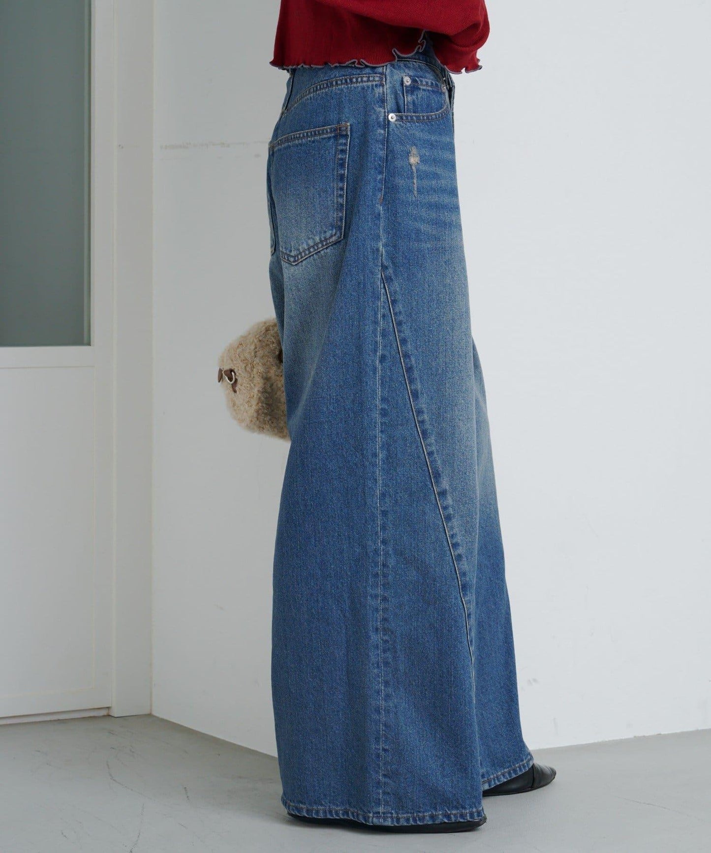 弧線縫線設計牛仔褲