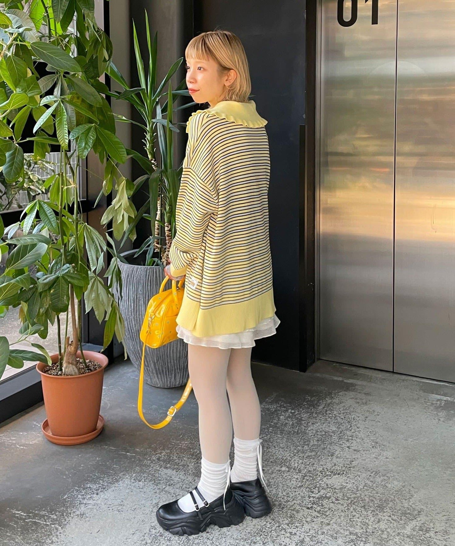 HELLO.SANFRANCISCO 大領條紋設計 POLO款 針織上衣