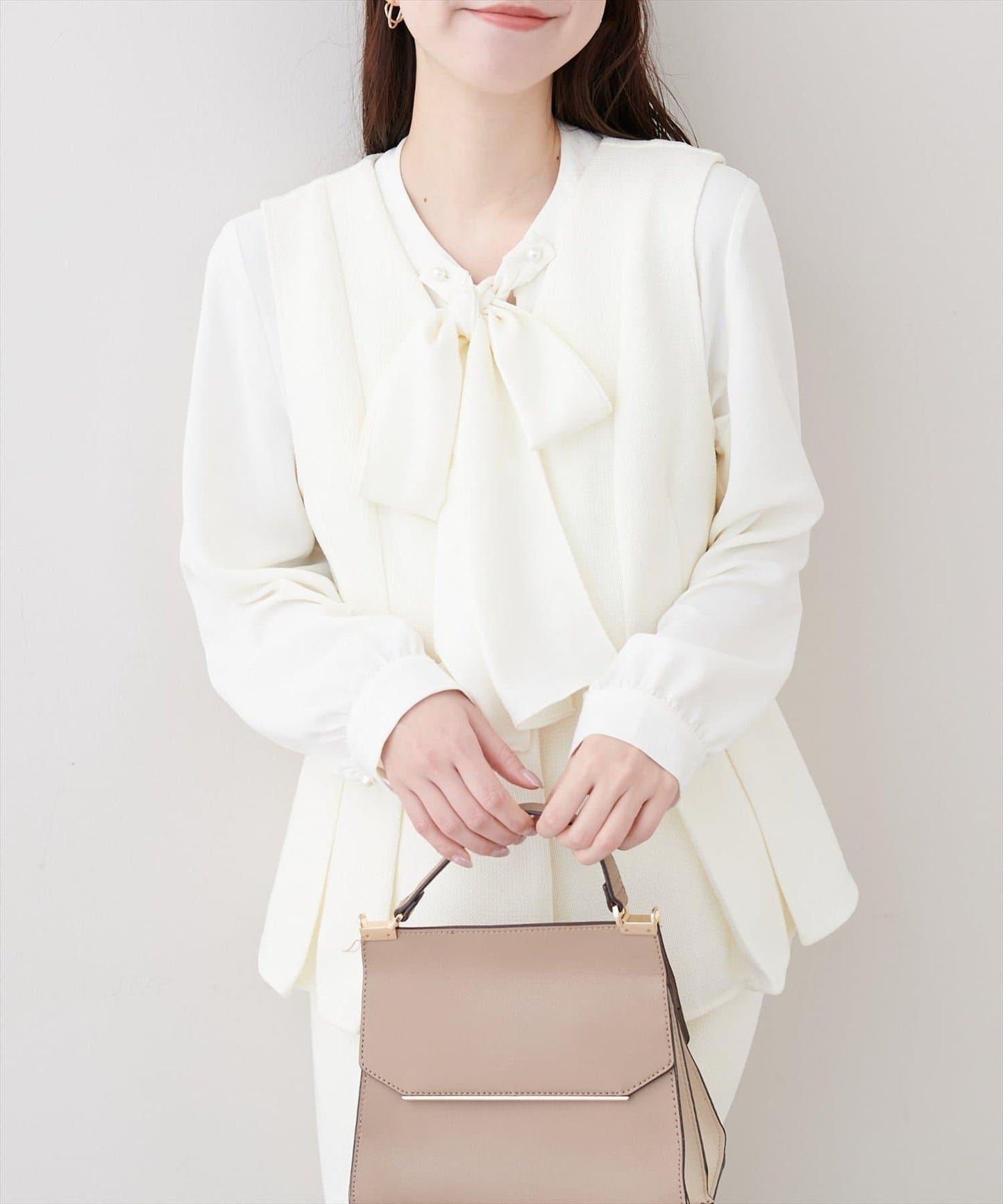 金扣荷葉下襬背心