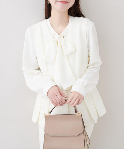 金扣荷葉下襬背心