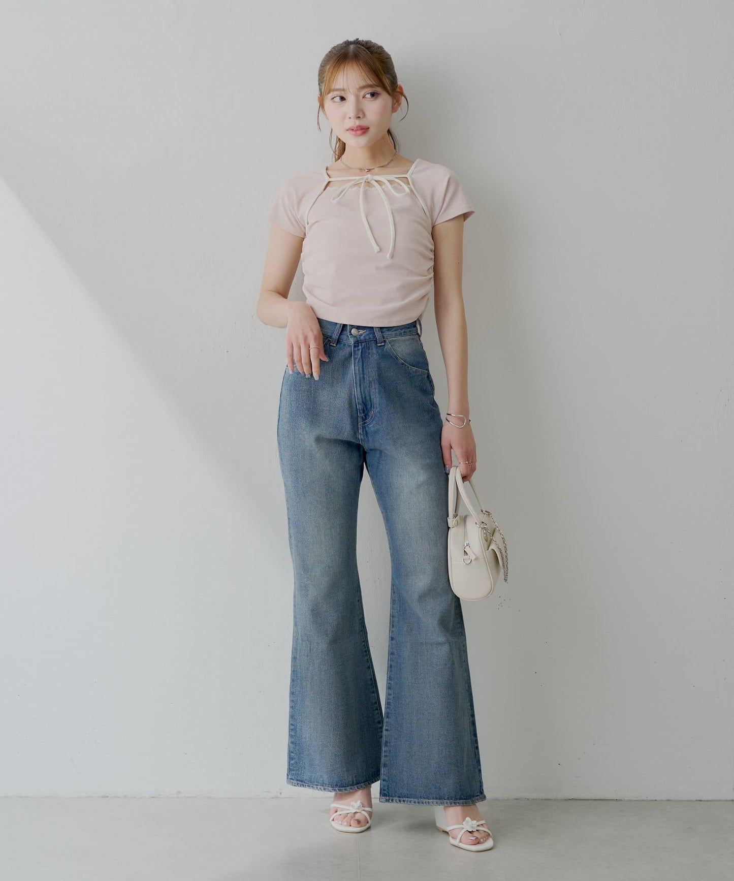 Chico 口袋刺繡緊身微喇牛仔褲