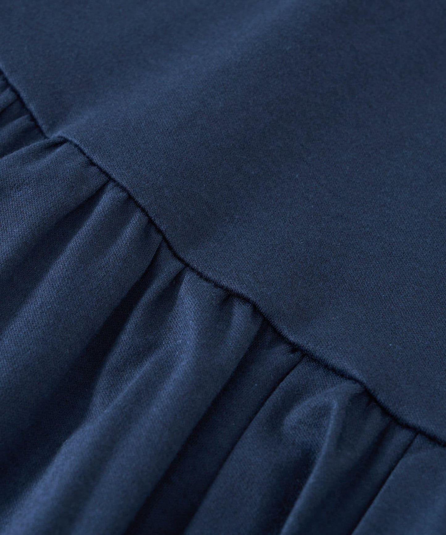 La boutique BonBon 不對稱荷葉擺設計 針織上衣