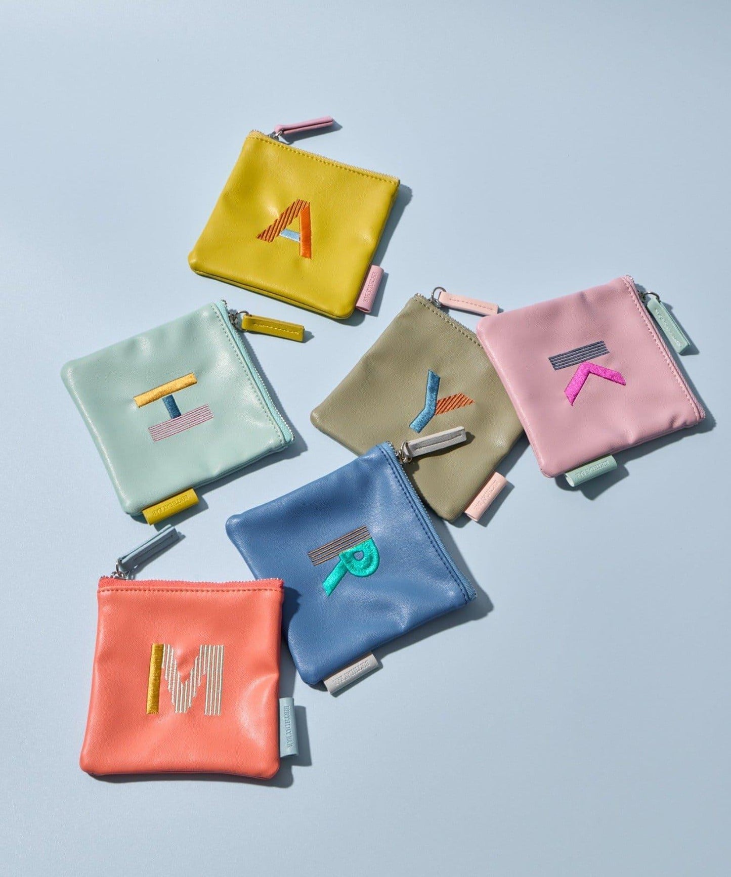 Kindly Yours 仿皮字母迷你收納包