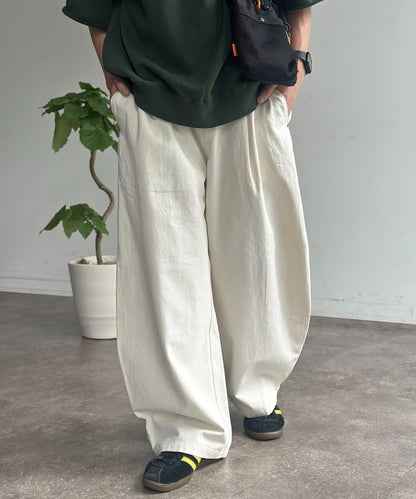 休閒彎刀帆布褲子