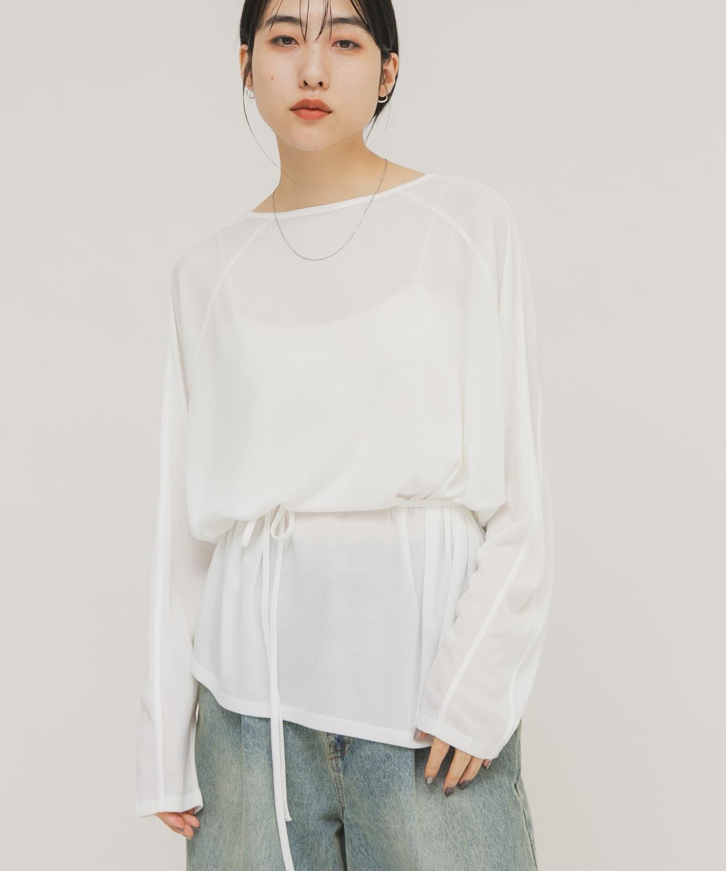 透肌寬鬆設計 配肩帶 上衣
