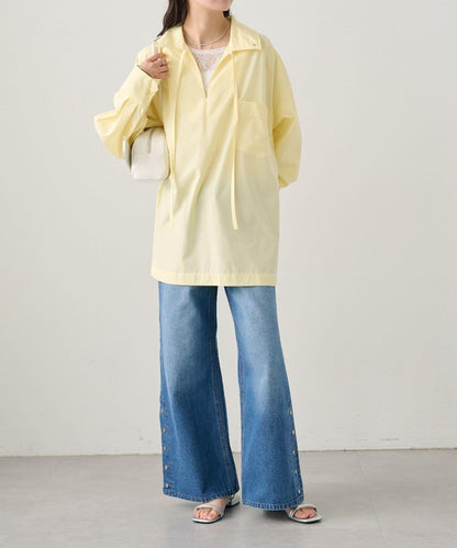 按鈕開叉喇叭牛仔褲