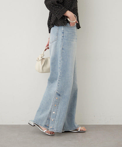 按鈕開叉喇叭牛仔褲