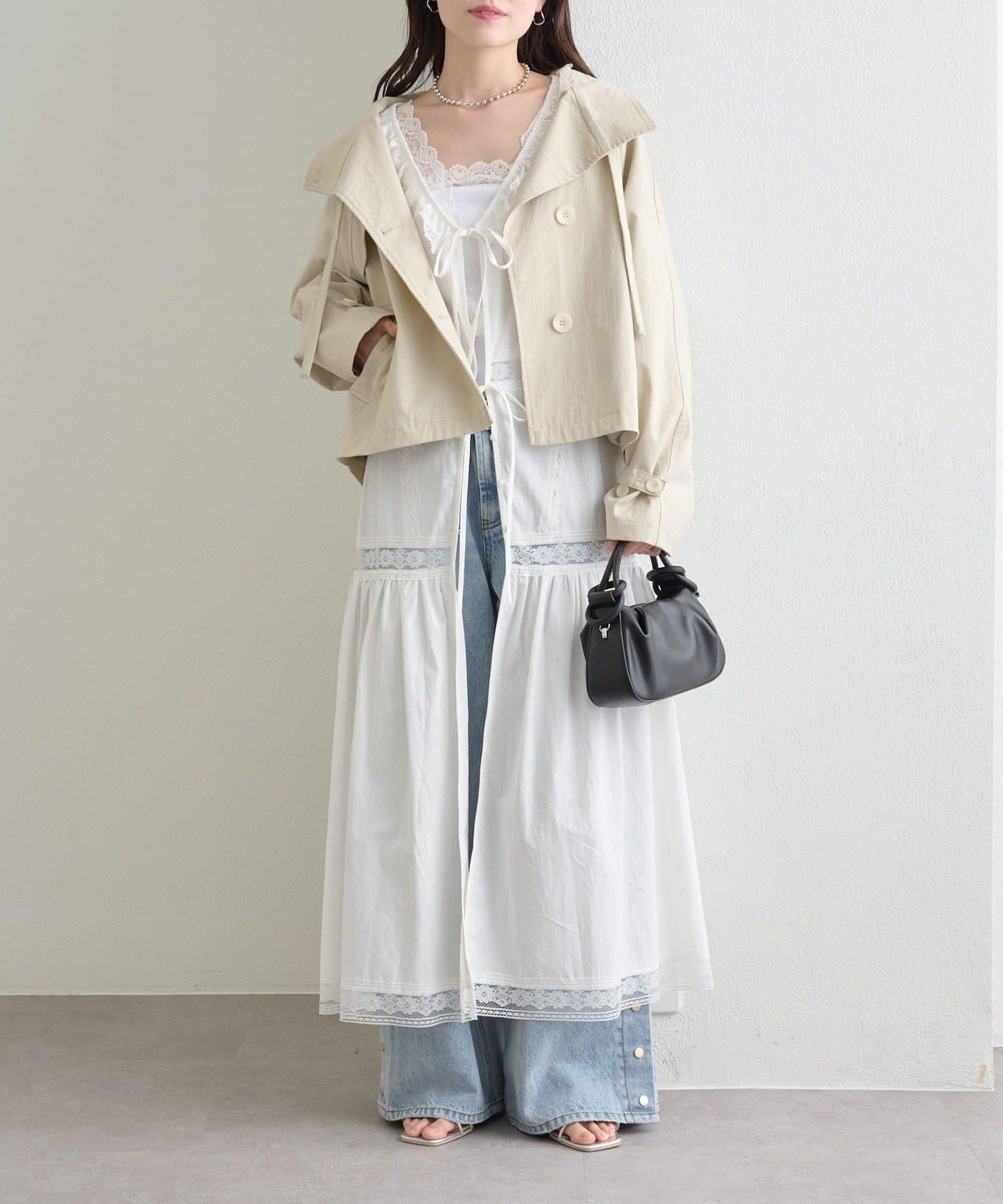 按鈕開叉喇叭牛仔褲