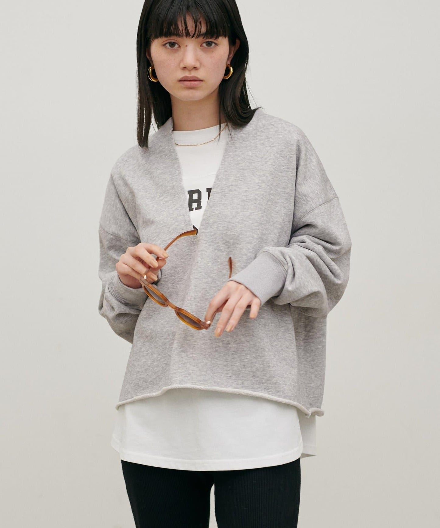 生邊開襟領毛圈套頭衛衣