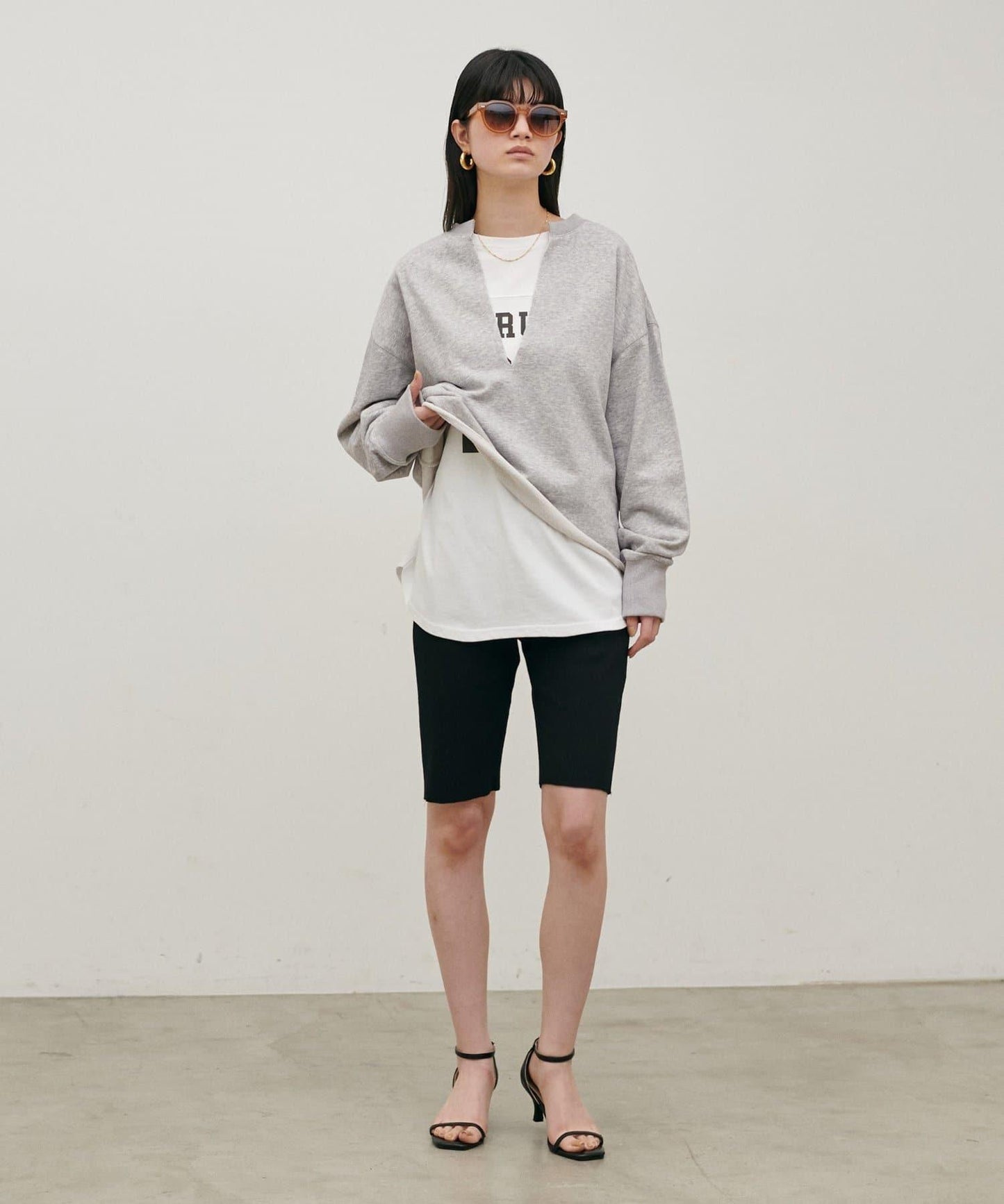 生邊開襟領毛圈套頭衛衣